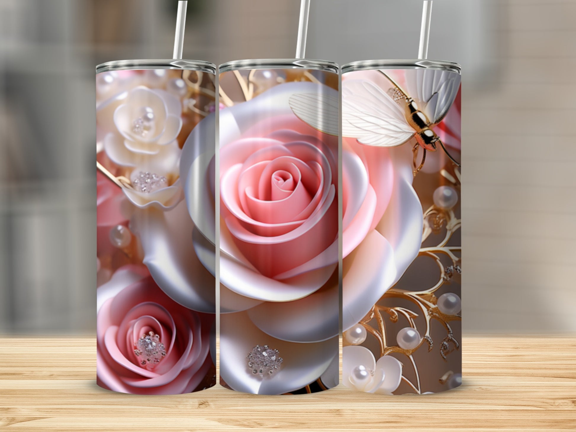Three pink and white roses with pearls and a butterfly design on tumblers.