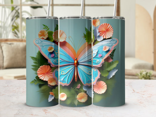 Tall tumbler with a large blue butterfly and orange floral design.