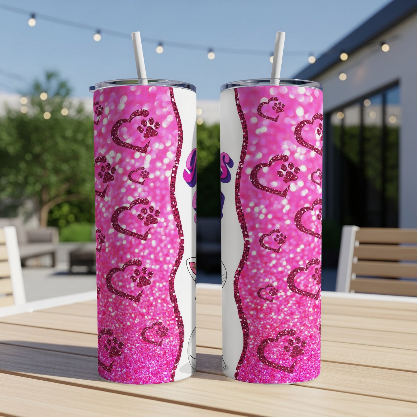 Two glittery pink tumblers with paw prints and sparkles.