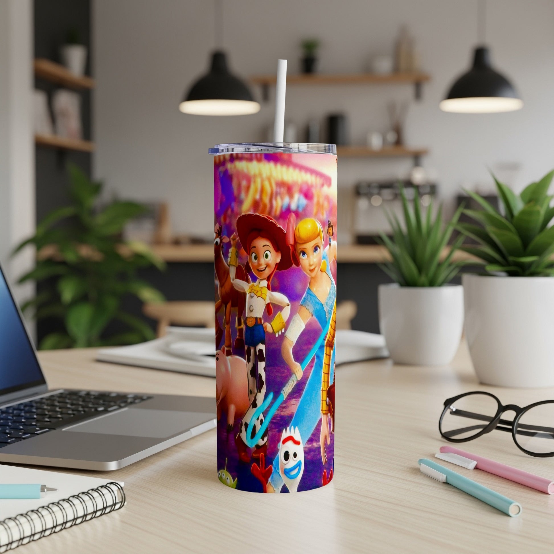 Toy Story characters Woody, Bo Peep, and Forky on a colorful tumbler.