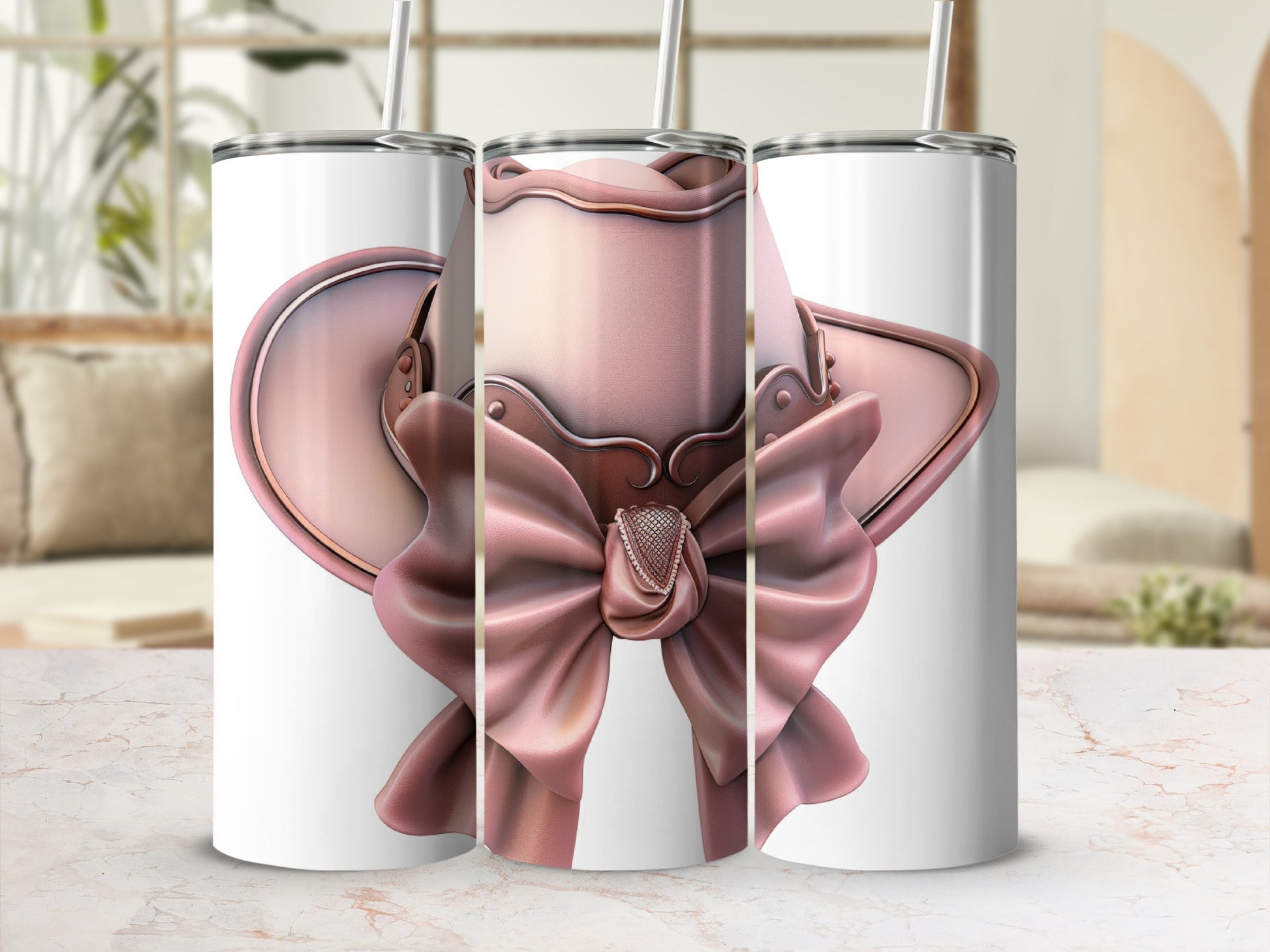 Pink bow adorned metal hat shown on three tumblers.