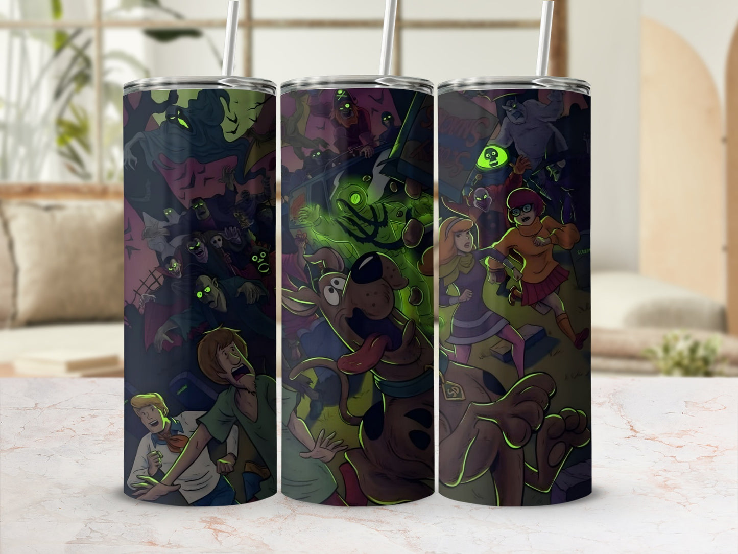 Scooby-Doo characters in a spooky, cartoonish scene on three tumblers.