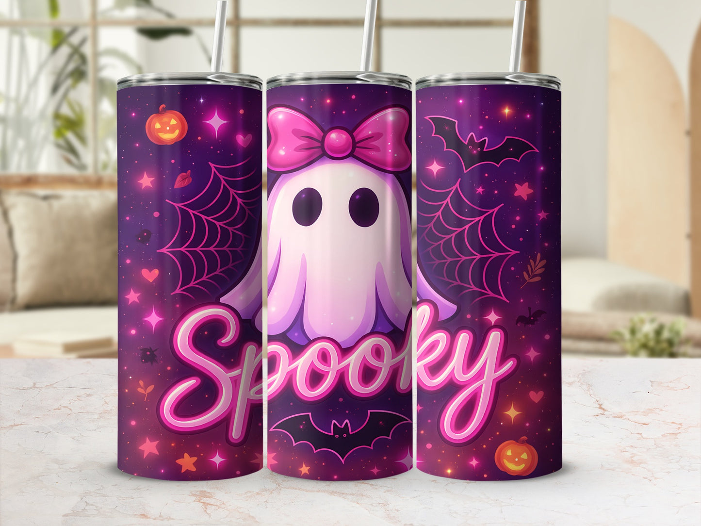 Three tumblers with a "Spooky" Halloween design featuring ghosts, bats, and pumpkins.