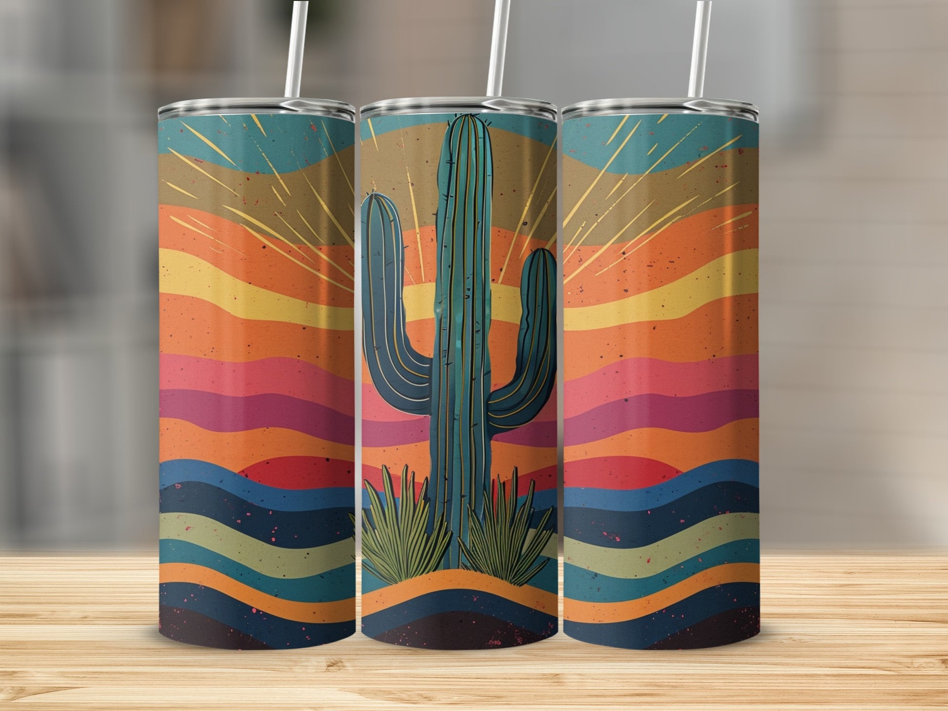 Three tumblers featuring a desert sunset with a saguaro cactus design.