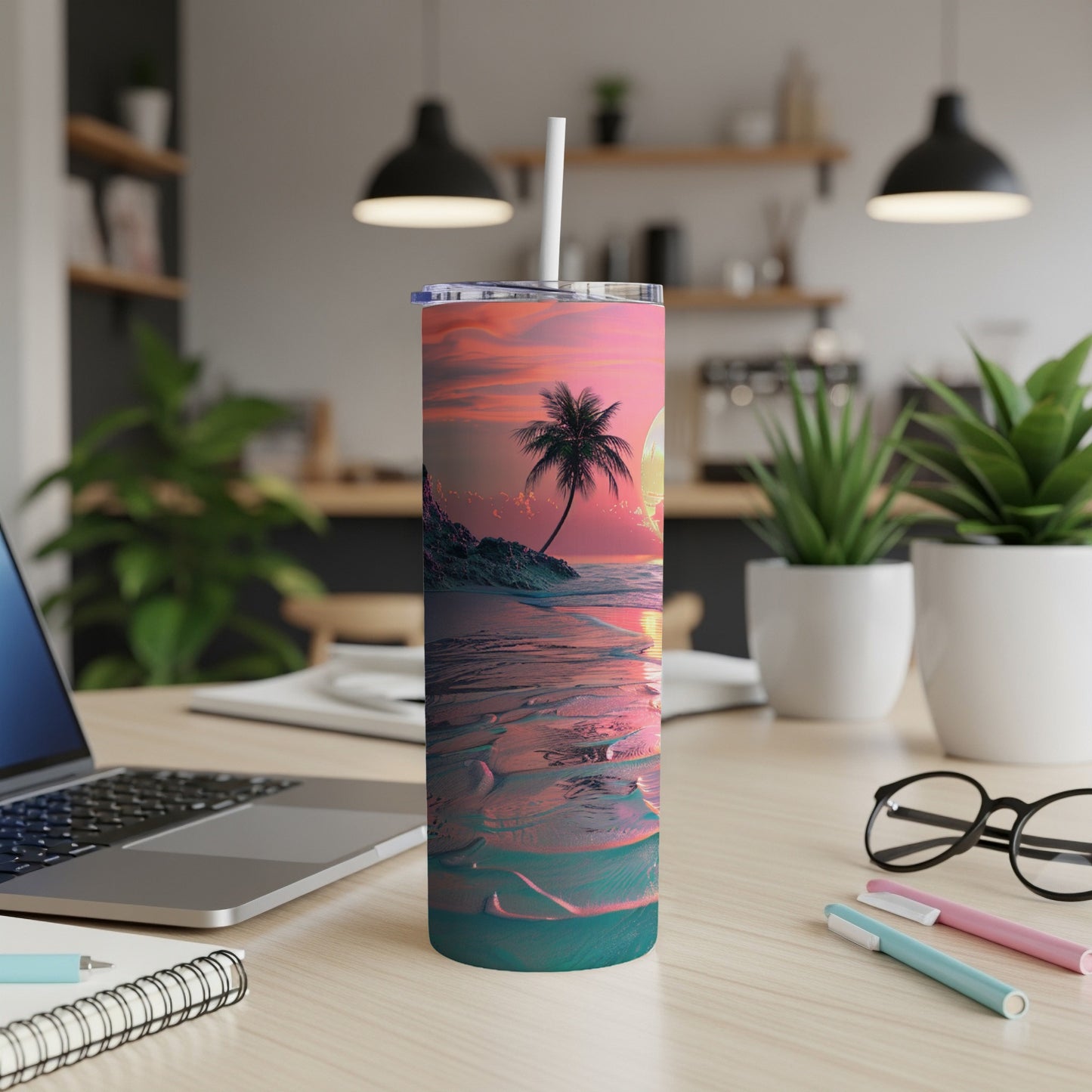 Tumbler with tropical beach sunset design and palm tree.