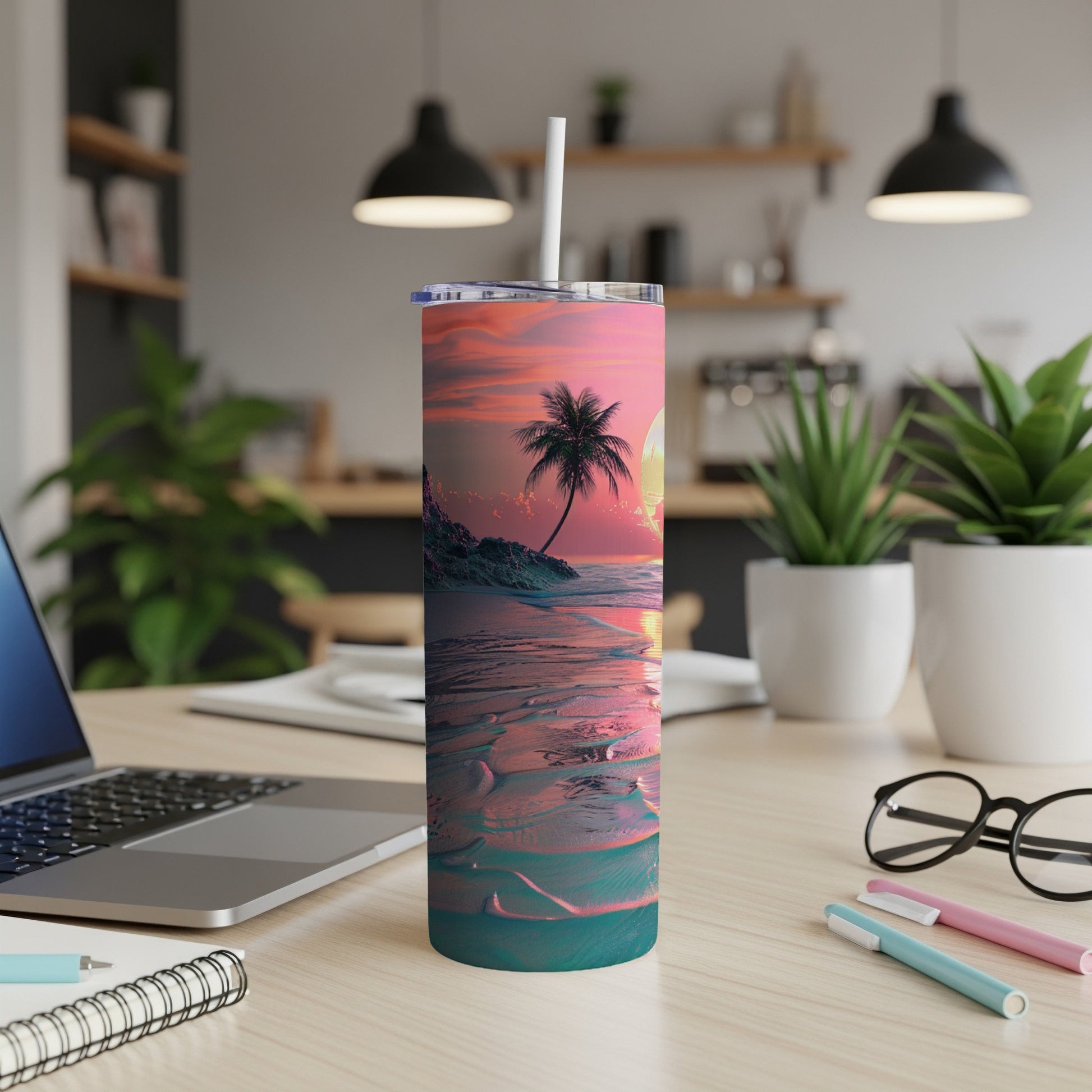 Tumbler with tropical beach sunset design and palm tree.
