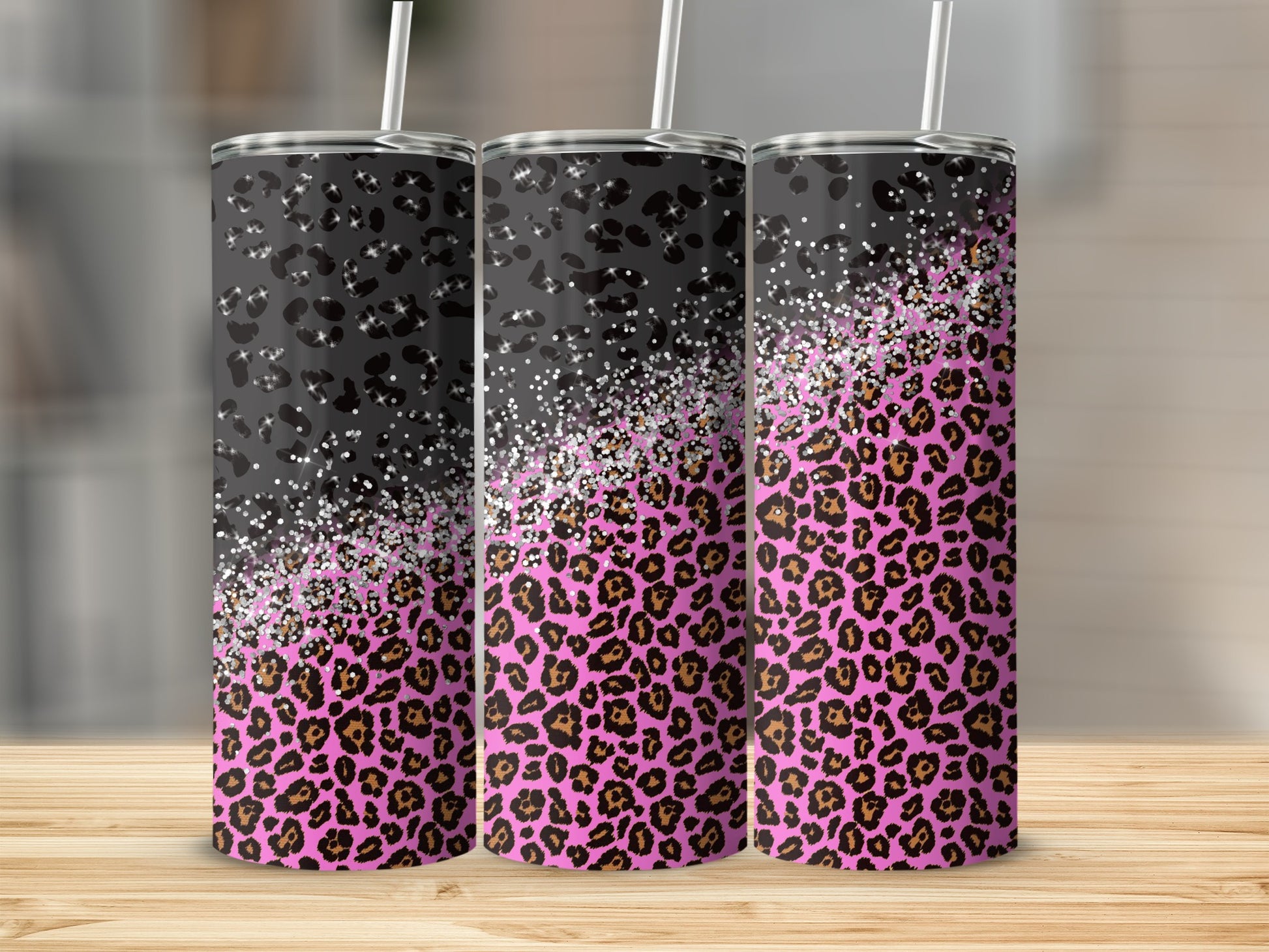 Three tumblers with black, pink leopard print, and glitter gradient.