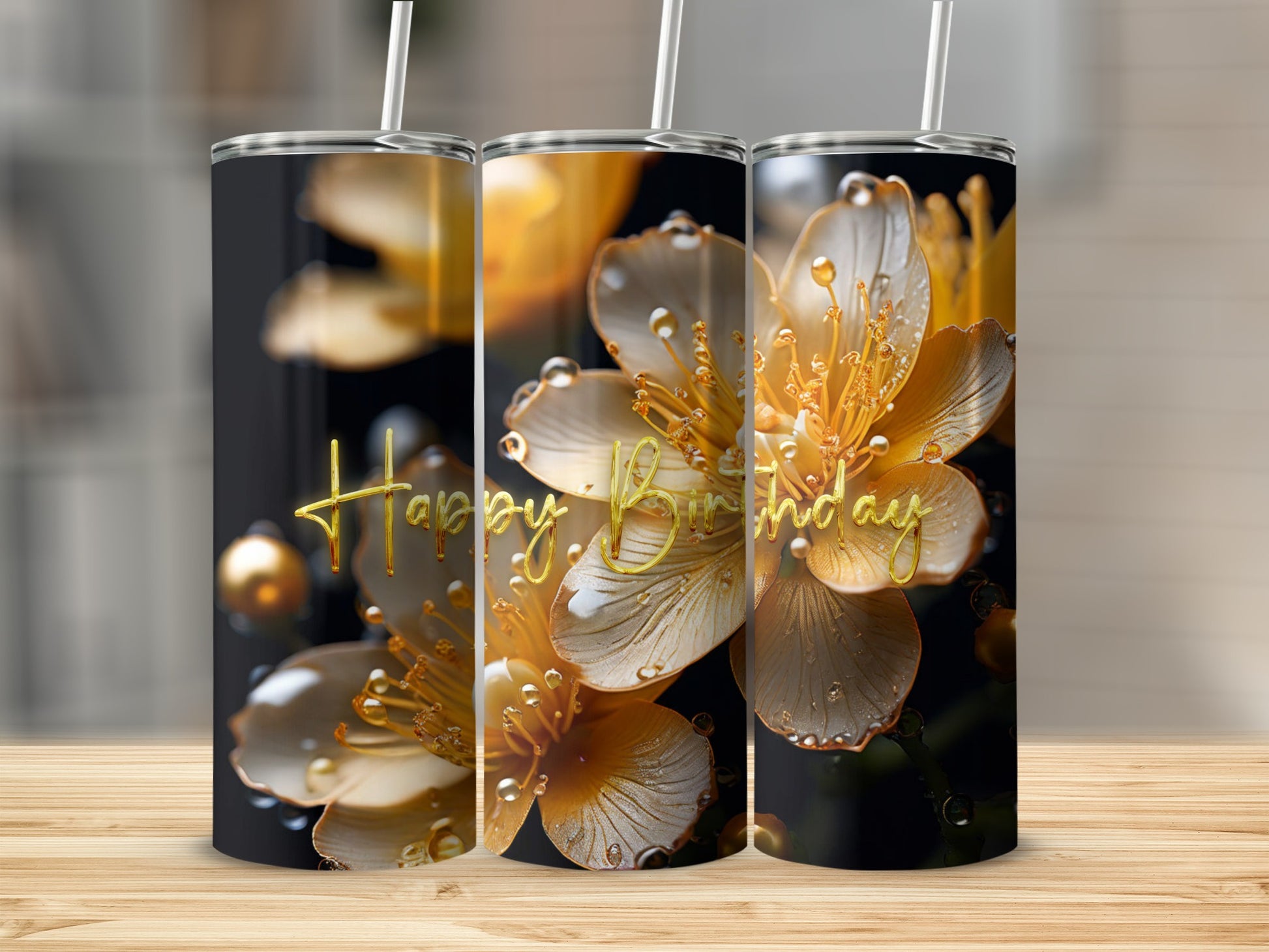 Three tumblers with golden flowers and "Happy Birthday" text.