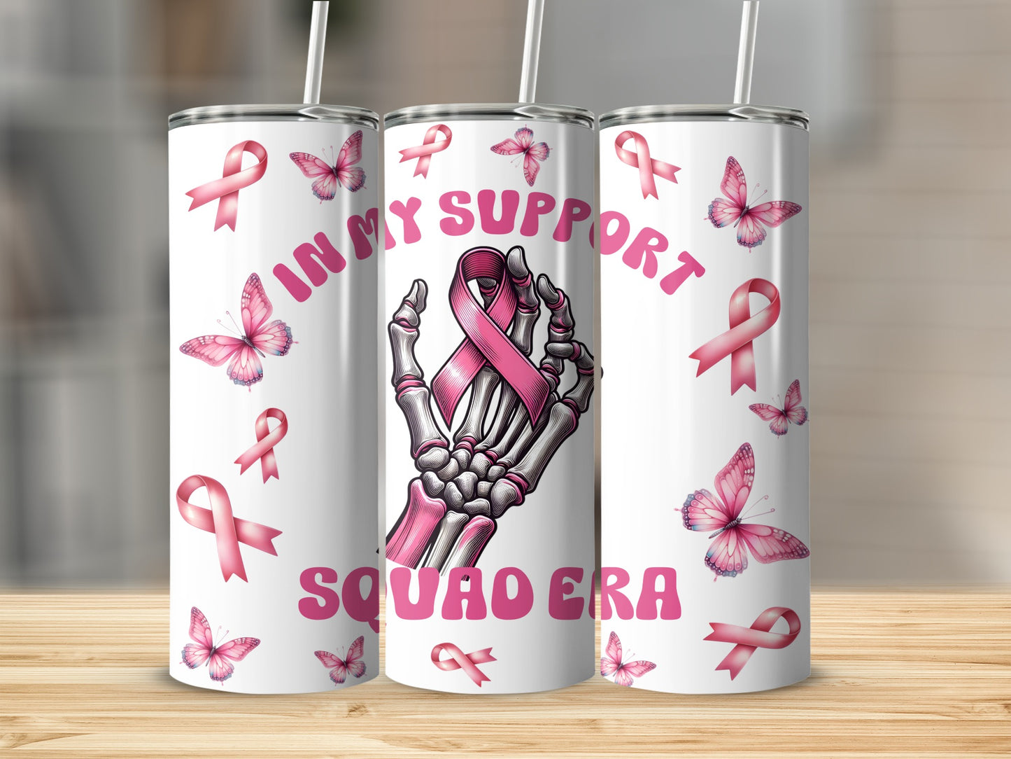 Pink ribbon support squad tumbler with skeleton hand and butterflies.