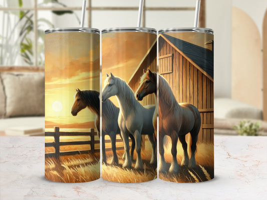 Three horses stand in a field at sunset with a barn in the background.