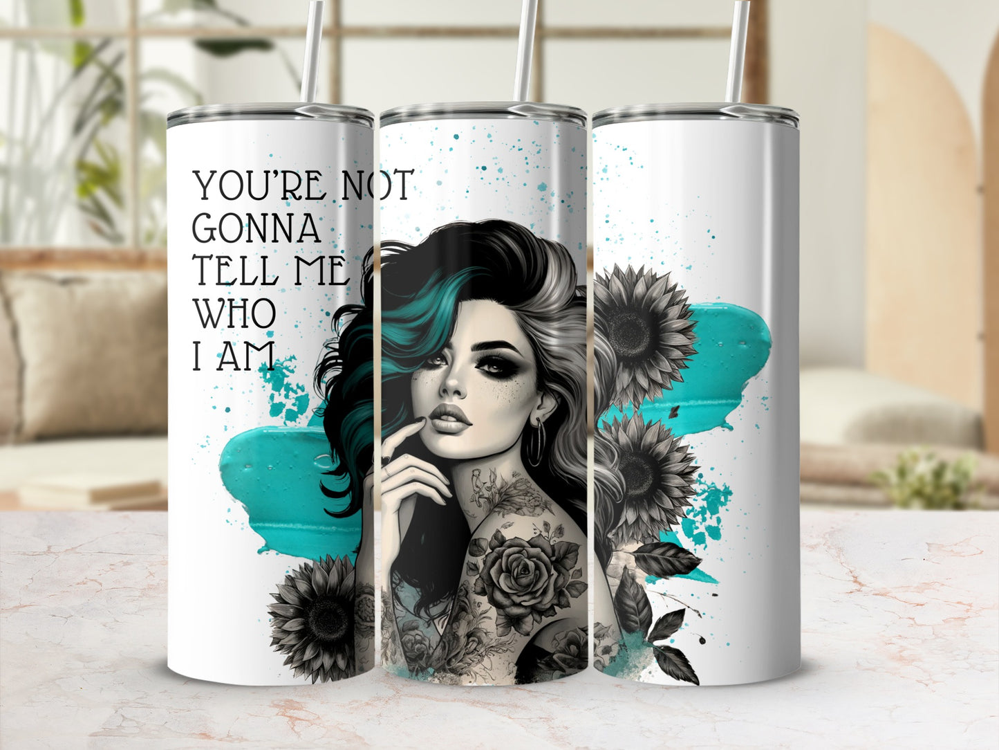 Tumbler with woman, sunflowers, and text "You're not gonna tell me who I am".