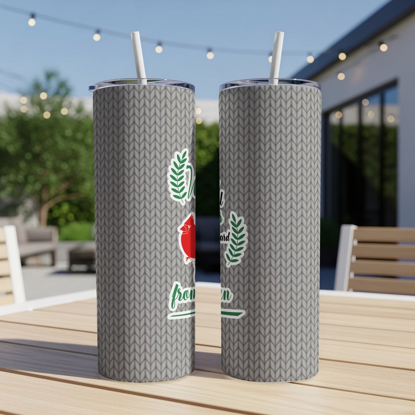 Gray knitted pattern tumbler with a red cardinal and green wreath design.