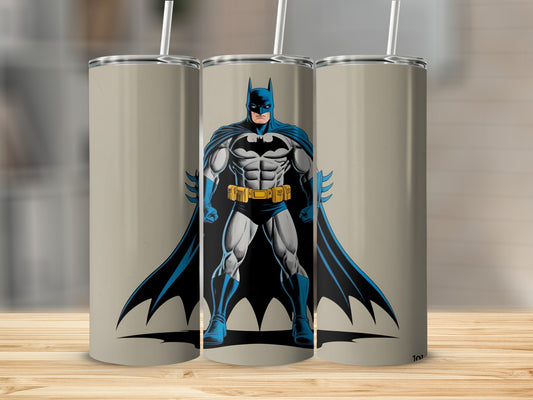 Batman standing center, front view, on a taupe background with two straw-topped tumblers.