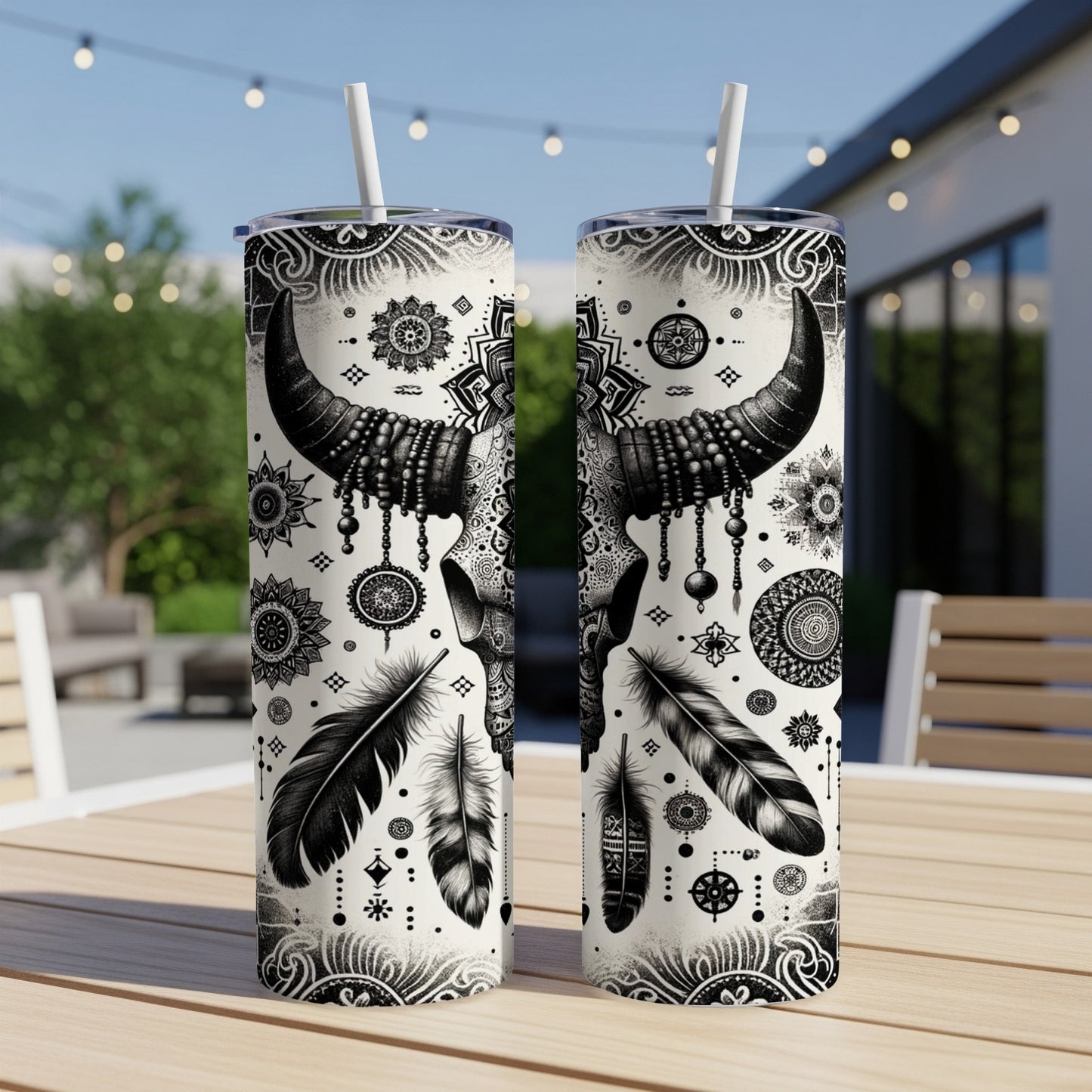 Black and white patterned tumbler with bull skull and feathers design.