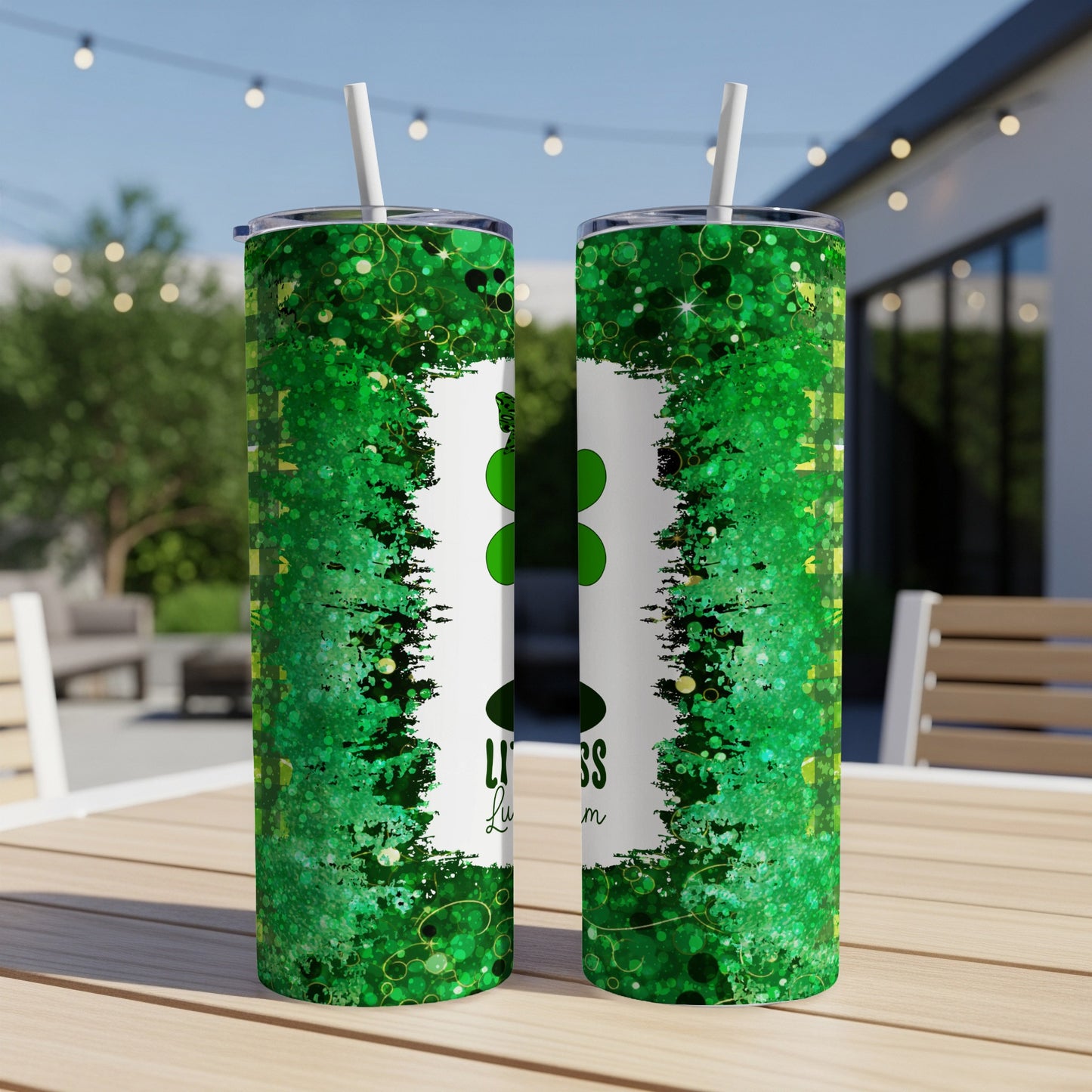 Two tumblers with green glitter and a shamrock design with text.