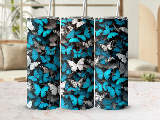 Three tumblers with a repeating pattern of blue and gray butterflies.