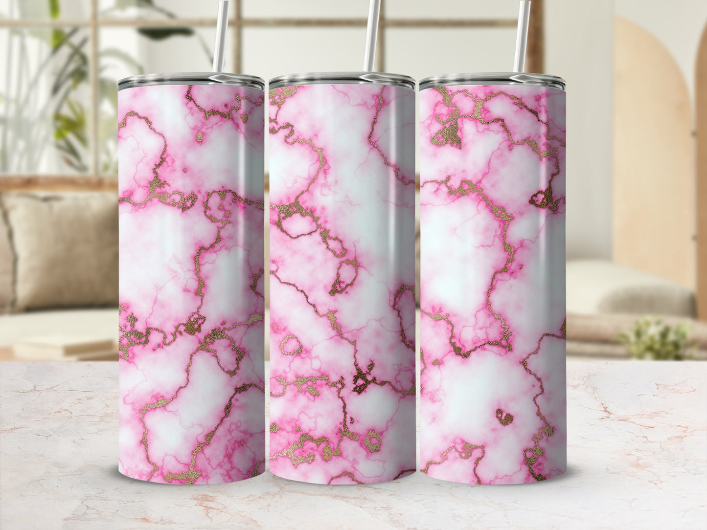 Pink marble tumbler with gold veining, shown with straw.