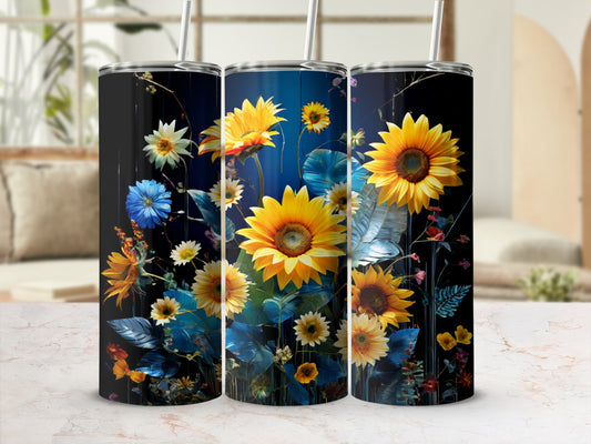 Three tumblers with sunflowers and blue flowers on a dark background.