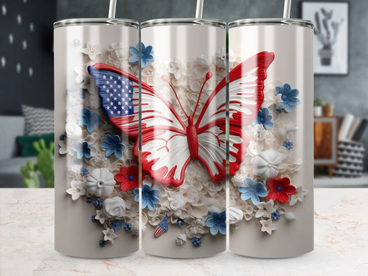 Butterfly with American flag wings on a floral patterned tumbler.