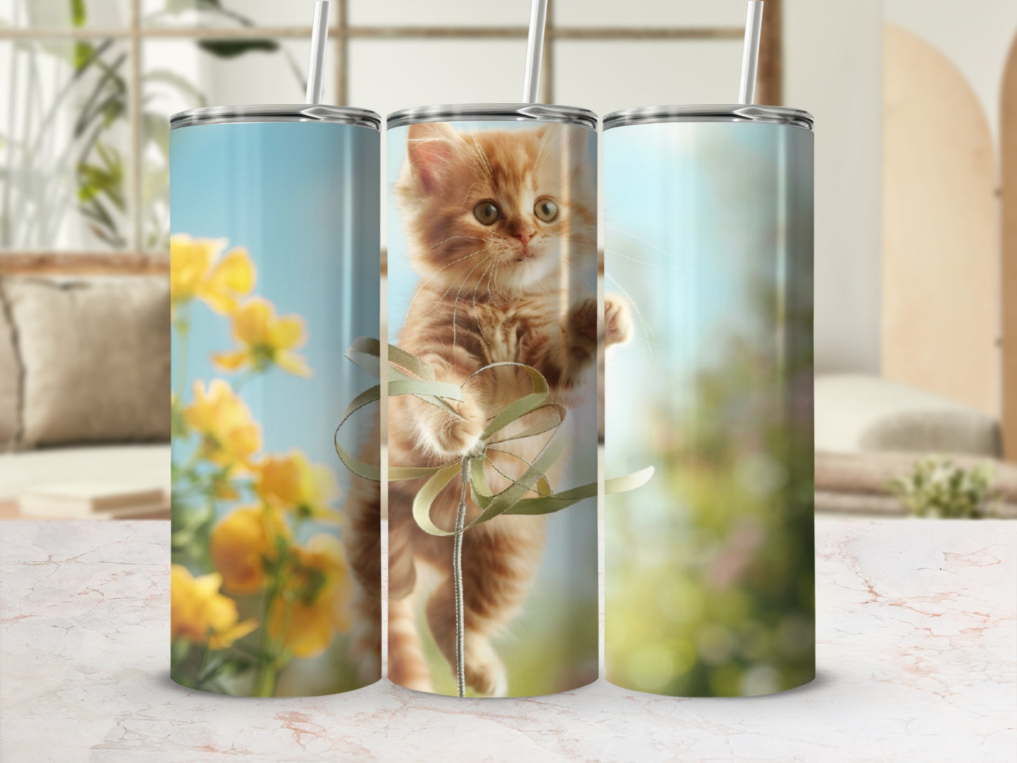 Orange kitten playing with ribbon, surrounded by blurred yellow flowers and foliage.