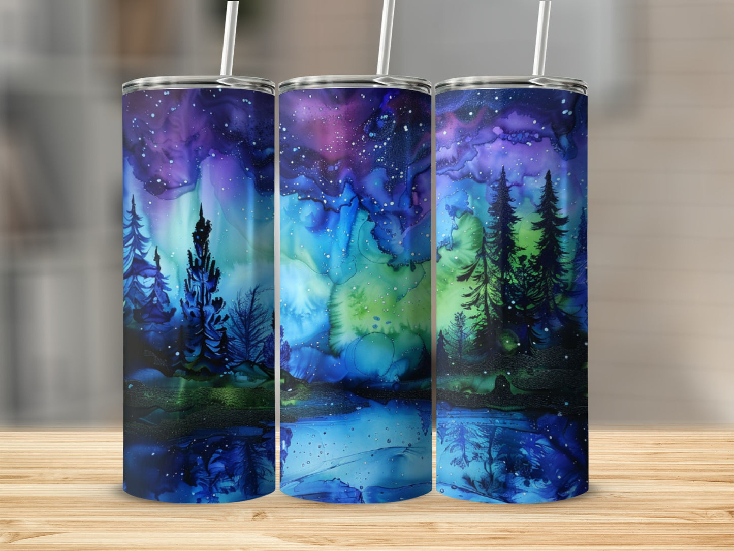 Three tumblers with a starry night sky over a dark forest and reflective water.
