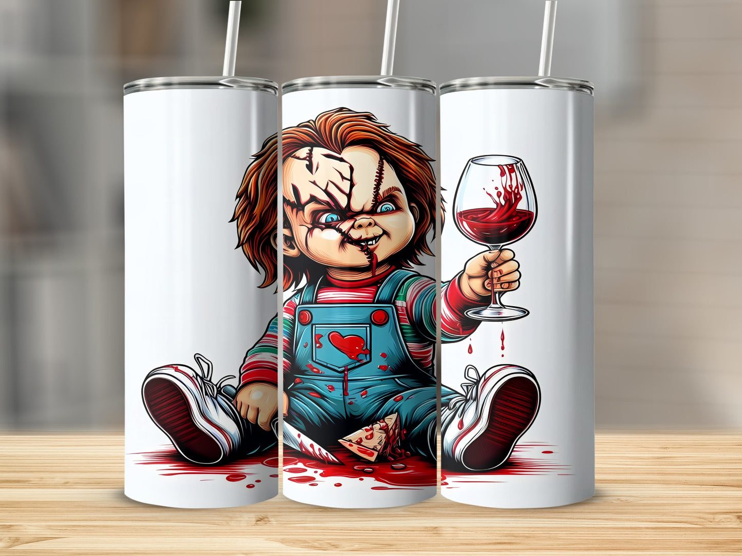 Chucky doll with bloody knife, wine, and splatters on white tumblers.