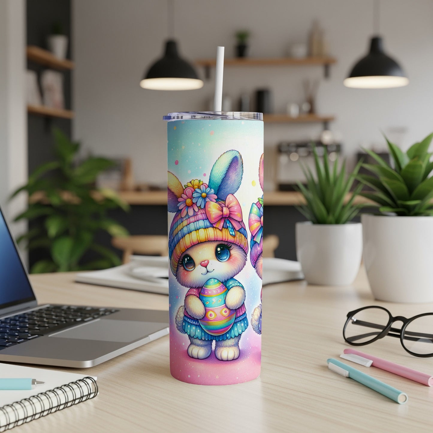 Cute bunny character holding an Easter egg on a colorful tumbler.