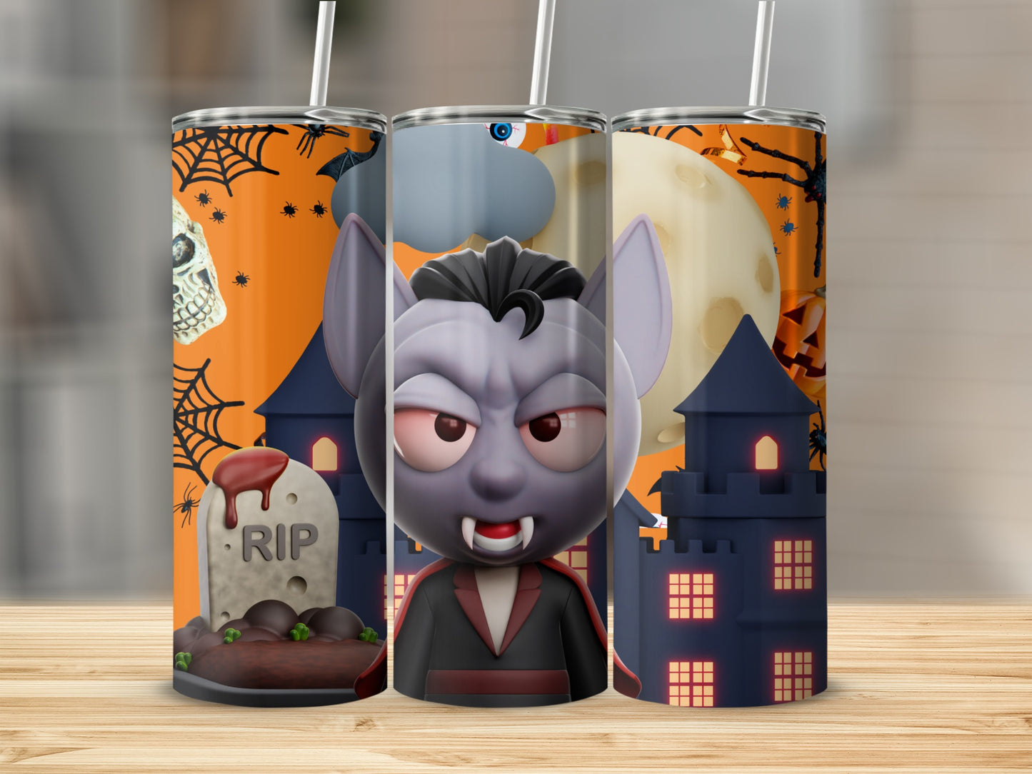 Halloween tumblers featuring a cartoon vampire, tombstone, castle, and spooky elements.