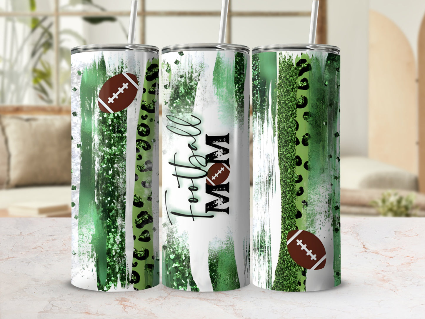 Green and white abstract tumbler with "Football Mom" text and football accents.