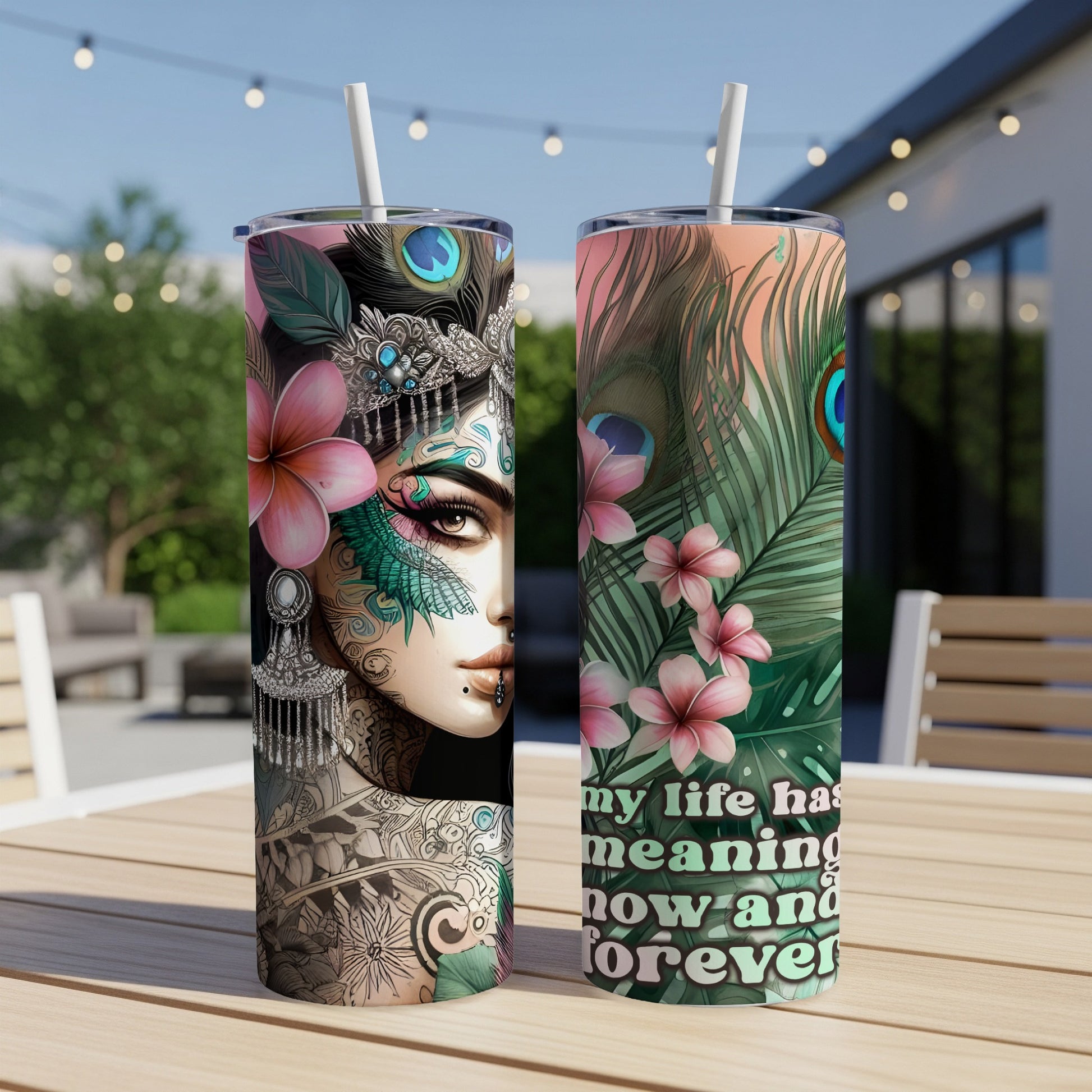 Tumbler with a woman's face and peacock feathers, reads "my life has meaning and forever".
