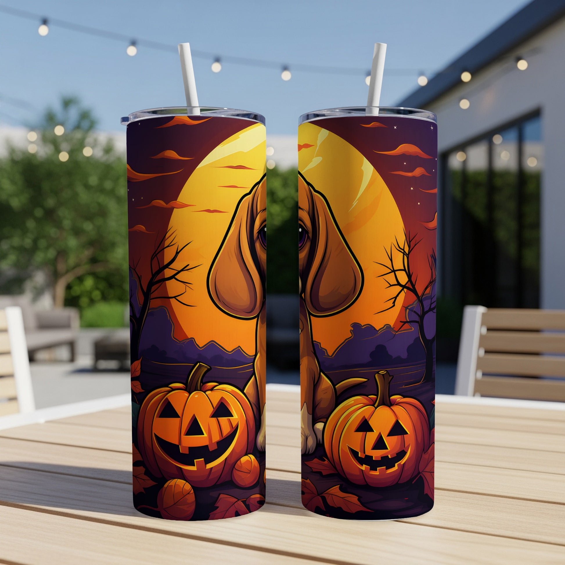 Two tumblers with a Halloween design featuring a dog and jack-o'-lanterns.