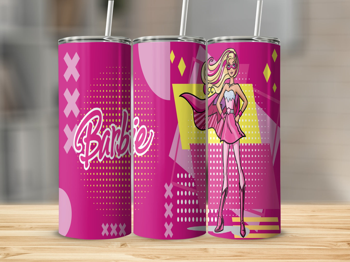 Barbie superhero tumbler with pink and yellow geometric patterns.
