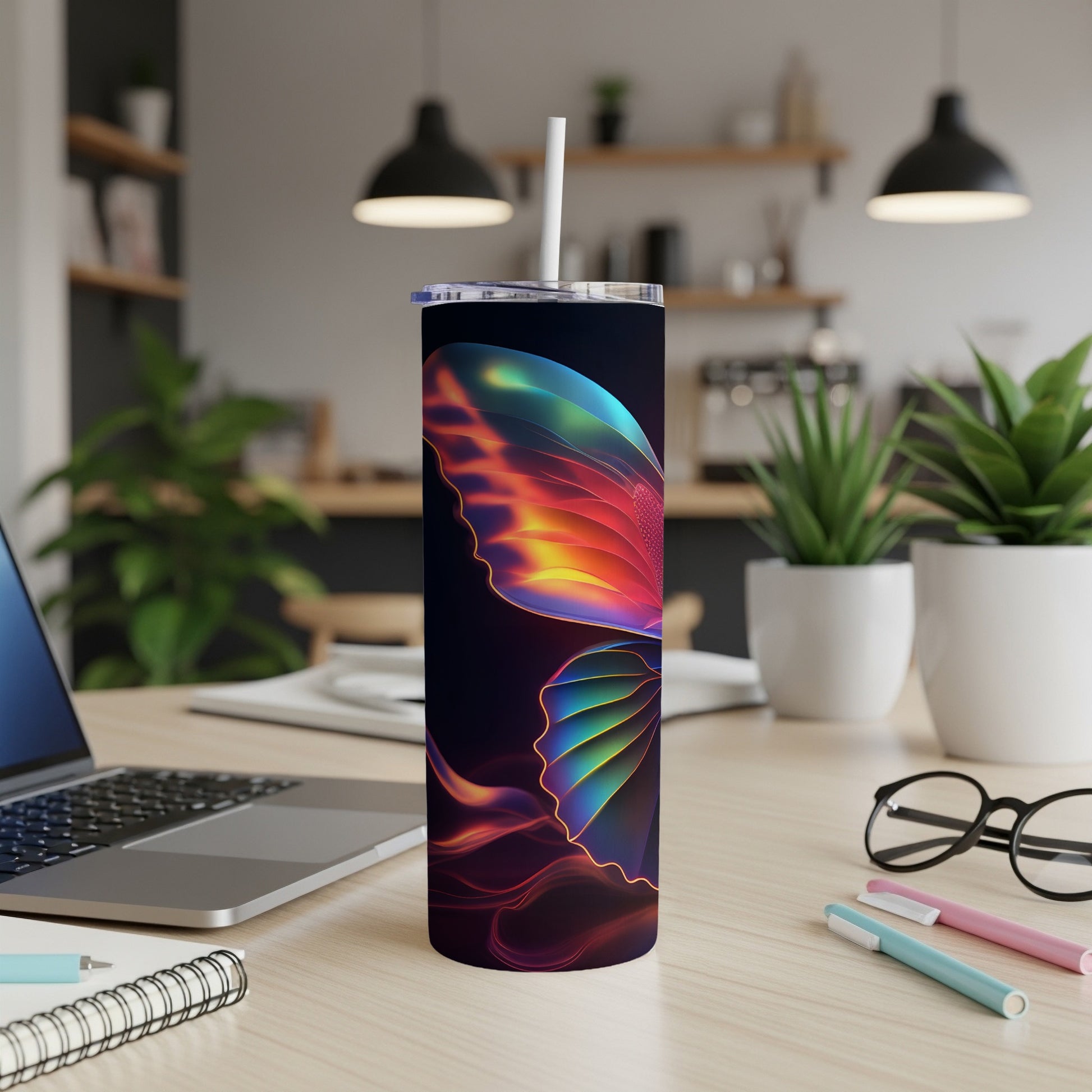 Dark tumbler with colorful iridescent butterfly wing design.