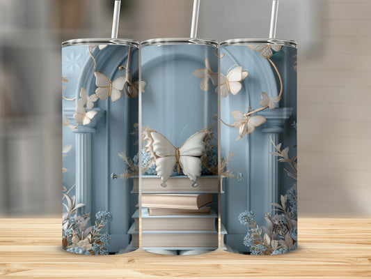 Three tumblers with a pale blue background and delicate butterfly and floral designs.