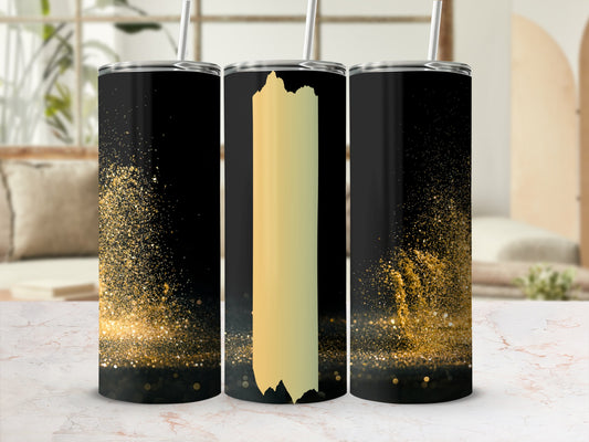 Black tumbler with gold glitter splatter and a vertical gold stripe.