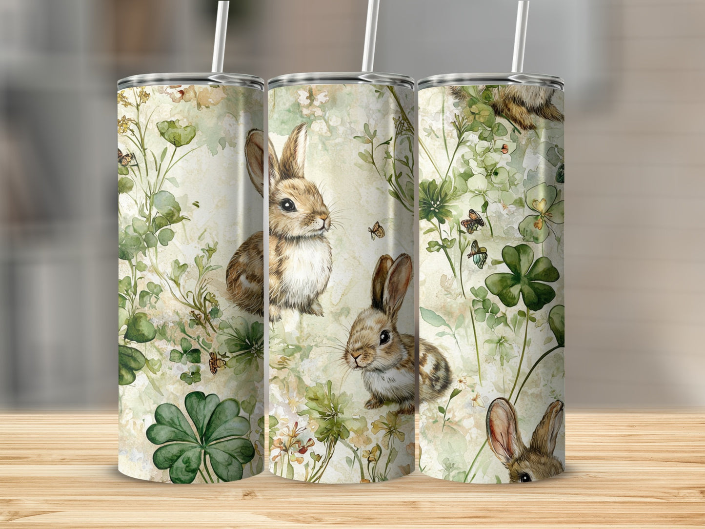 Three tumblers with bunny and clover pattern.