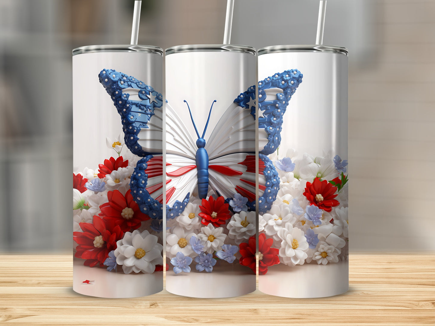 Butterfly tumbler with red, white, and blue floral accents.
