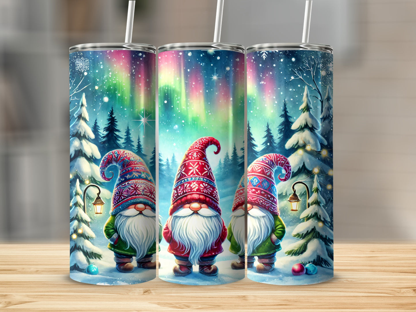 Three gnomes in festive hats under a vibrant aurora borealis.