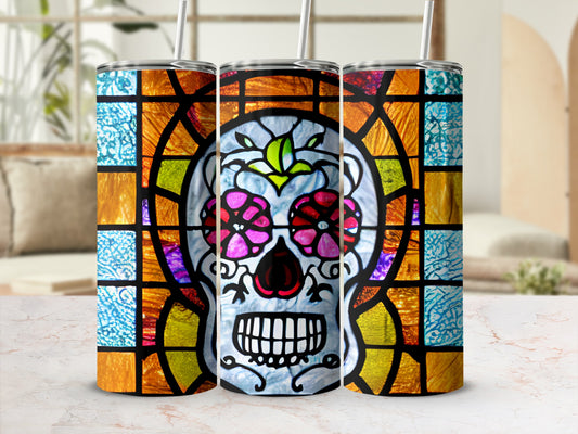 Stained glass sugar skull tumbler with colorful floral eye accents.
