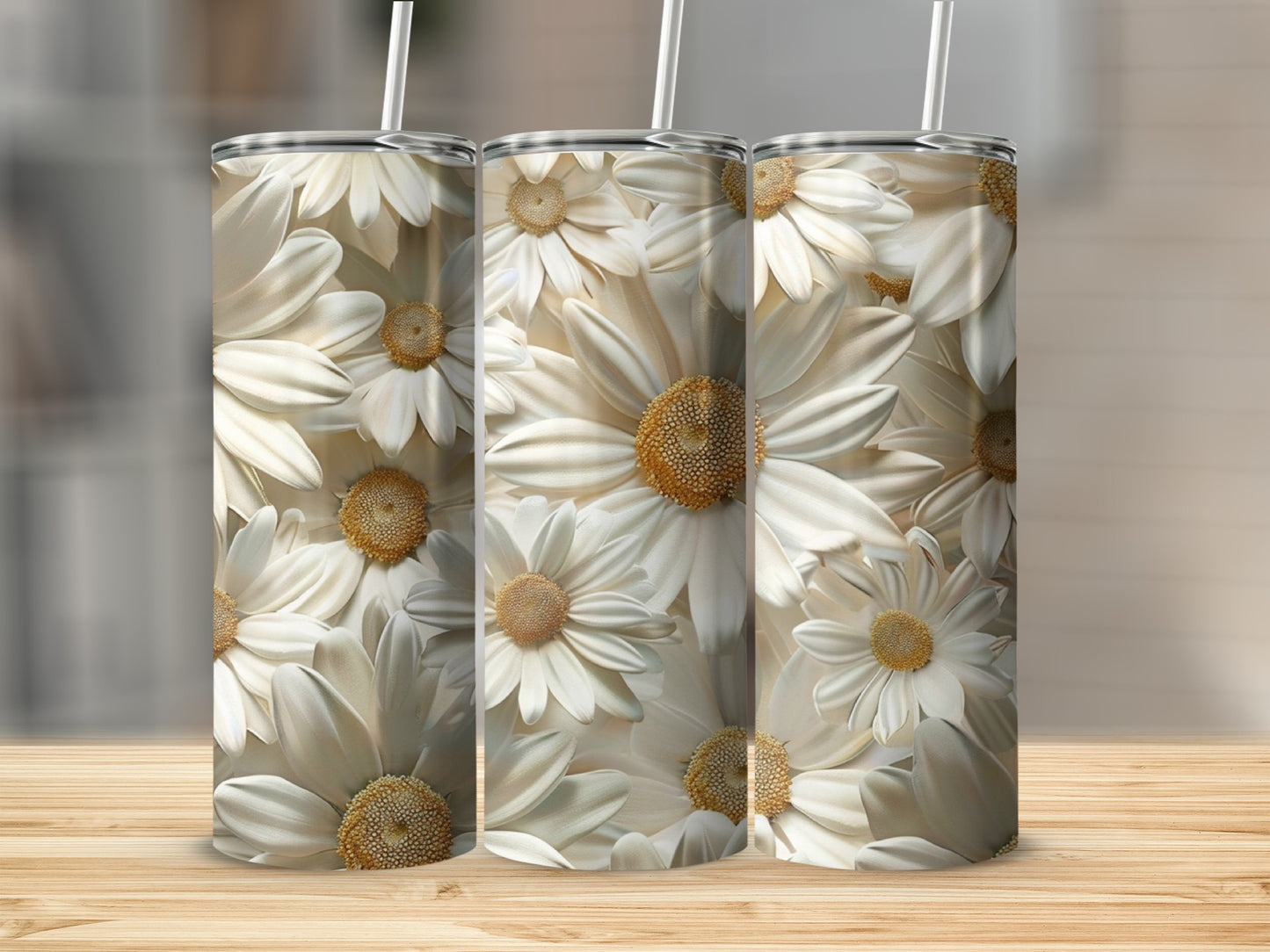 Three white daisy tumblers with yellow centers on a wooden surface.