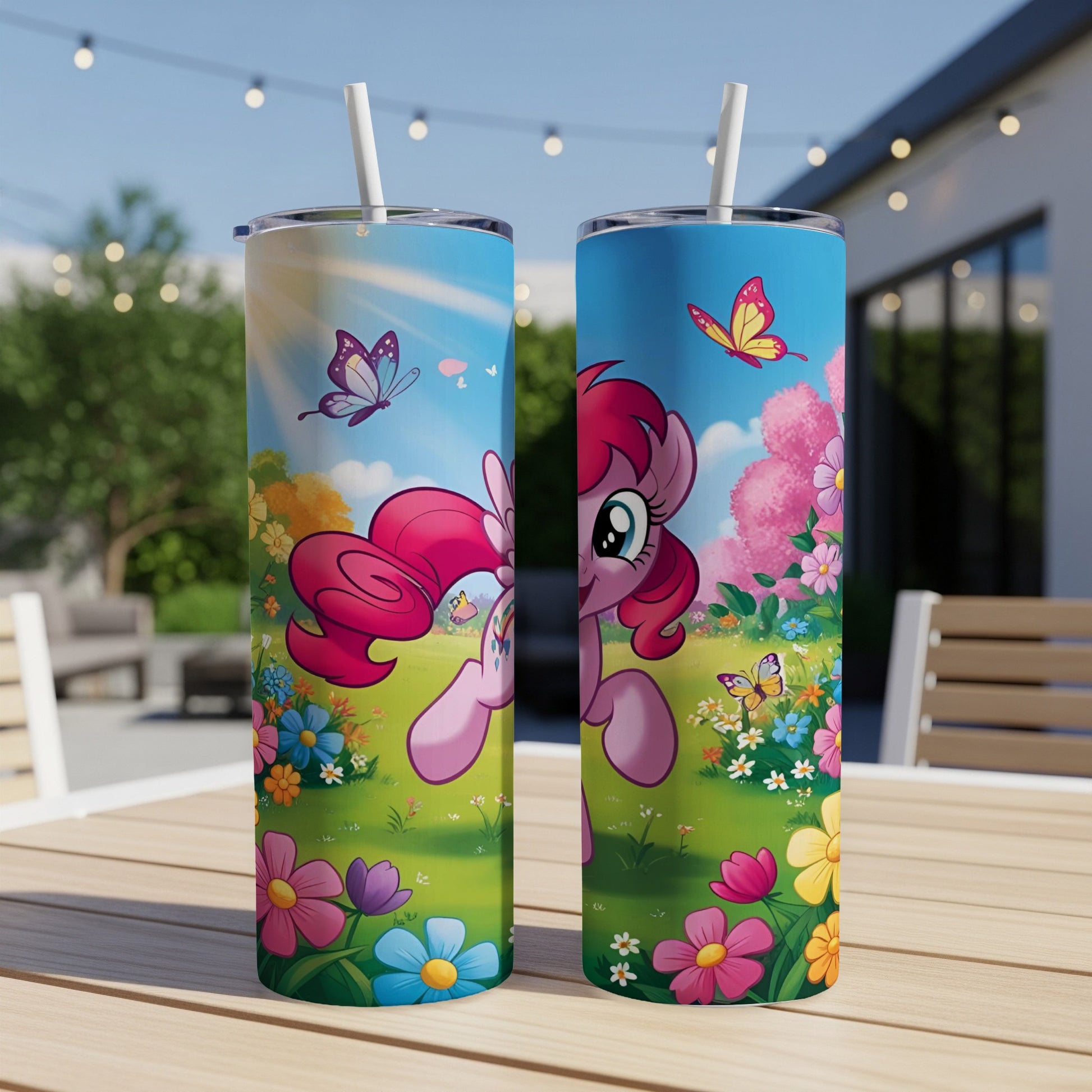 Pink pony with butterflies and flowers on a cartoon-style tumbler.