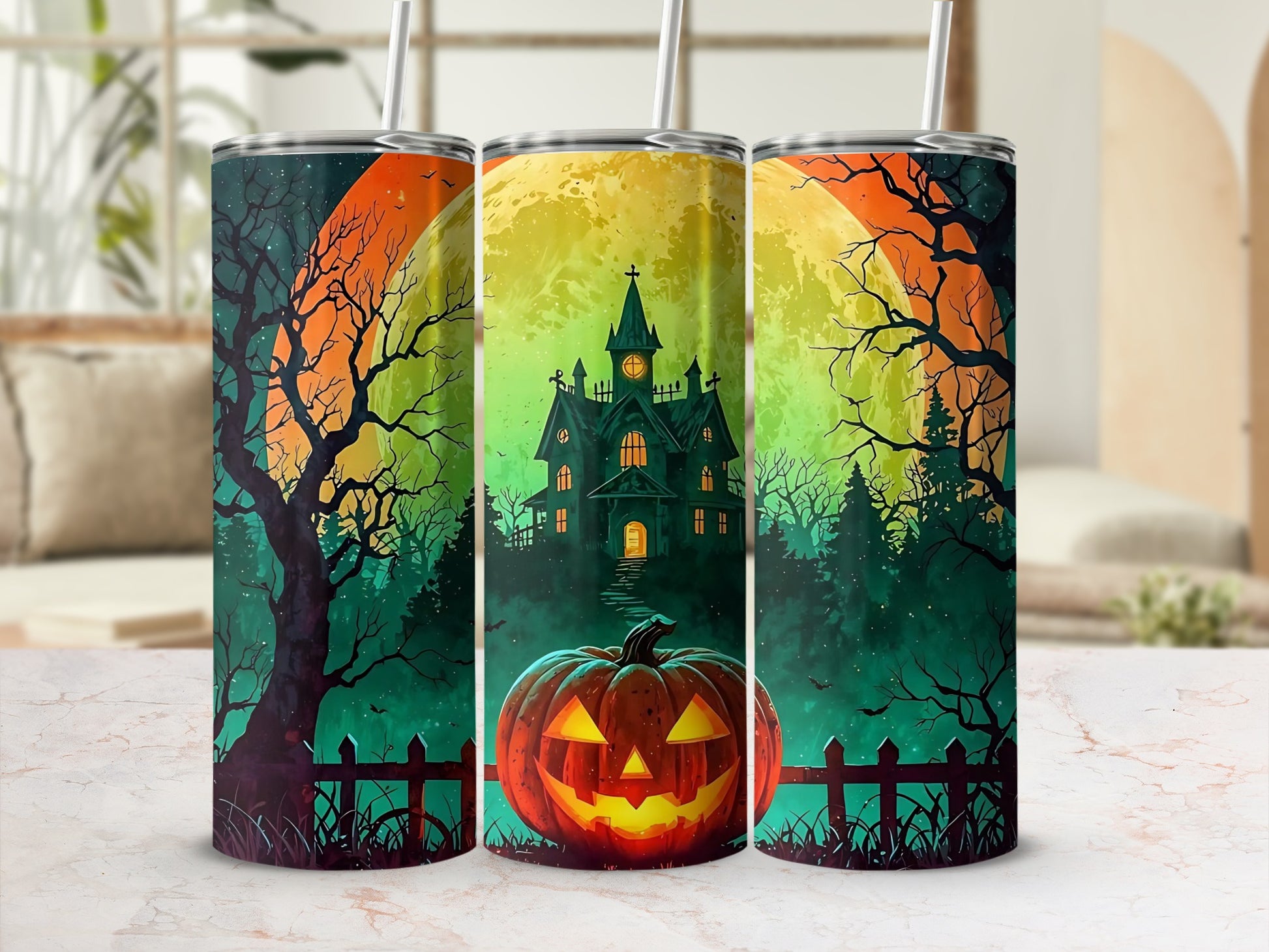 Halloween tumblers with a spooky haunted house, jack-o'-lantern, and moon design.