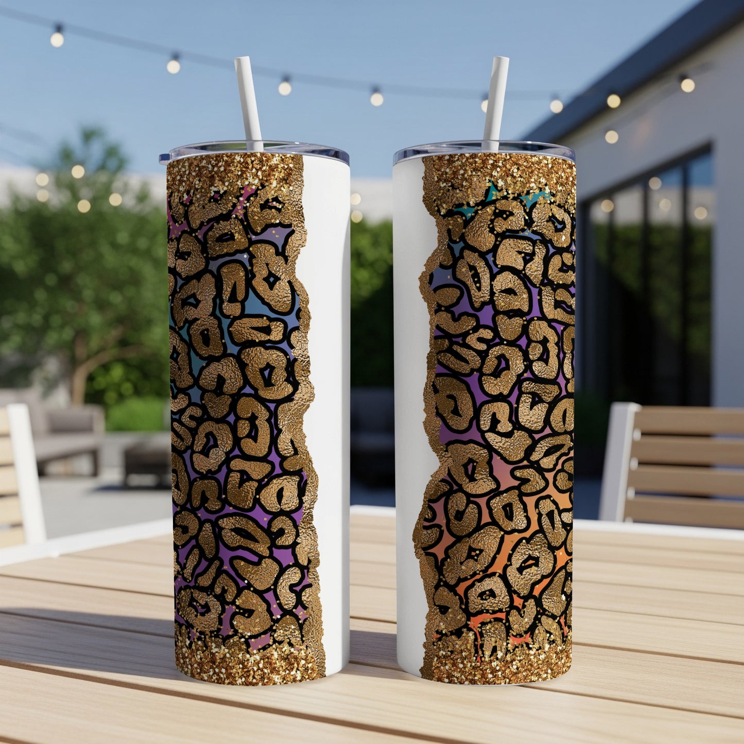 Two white tumblers with gold leopard print and colorful accents.