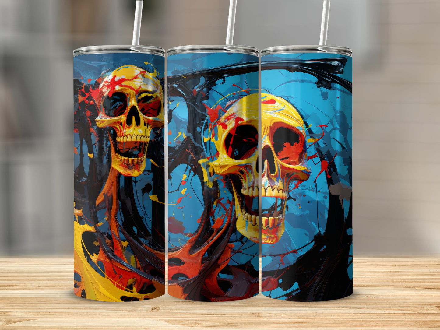 Three tumblers with a colorful abstract skull design and black paint splatters.