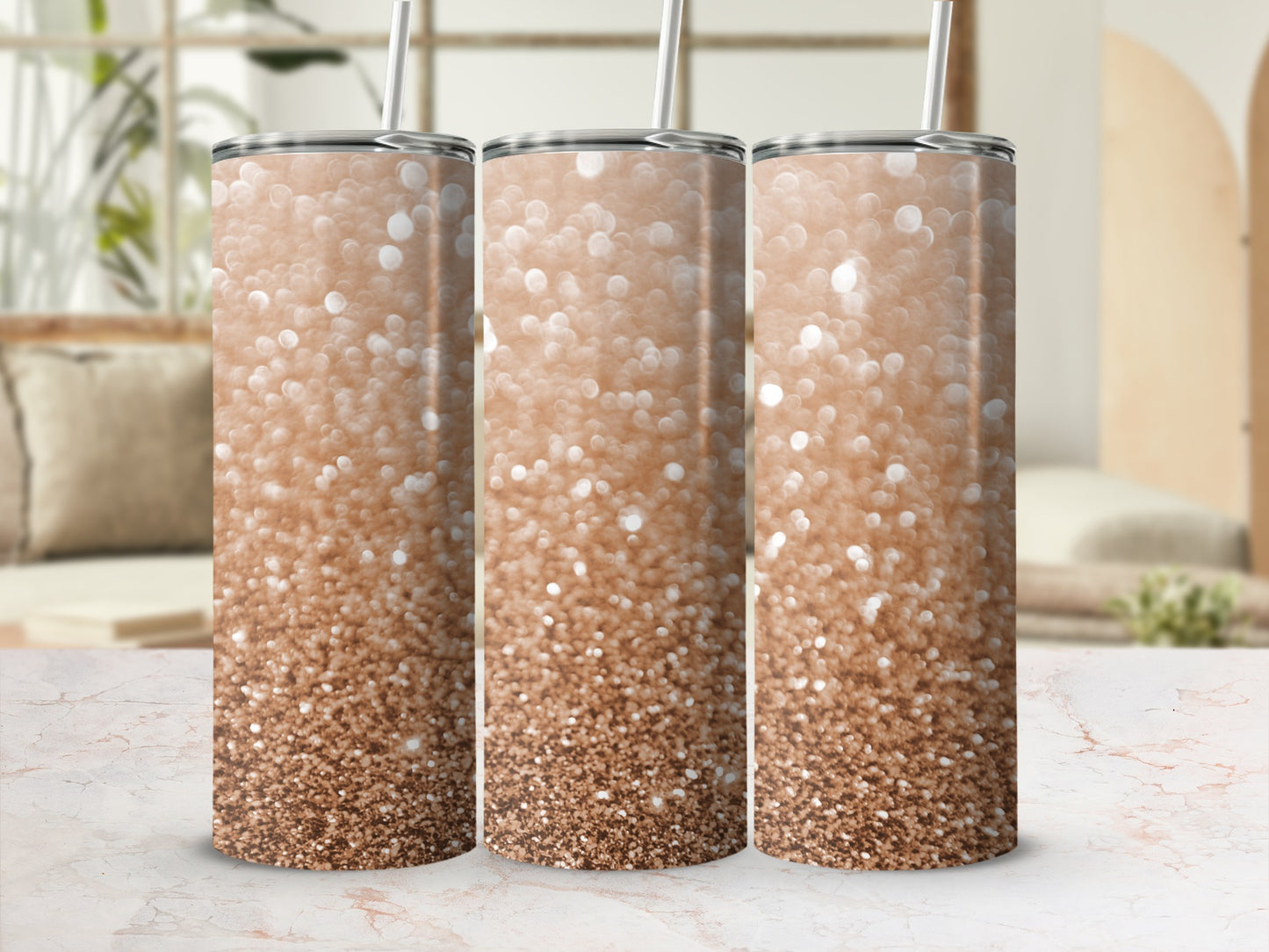 Three rose gold glitter tumblers with straws in a studio setting.