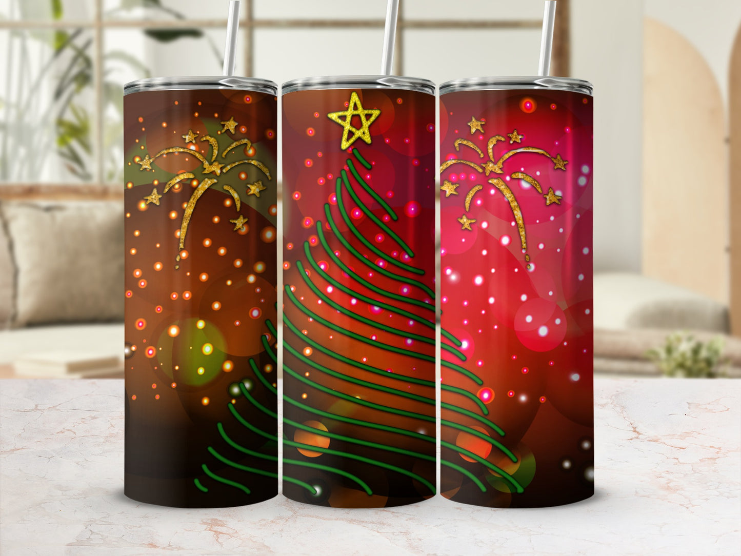 Three tumblers with a Christmas tree and star design.