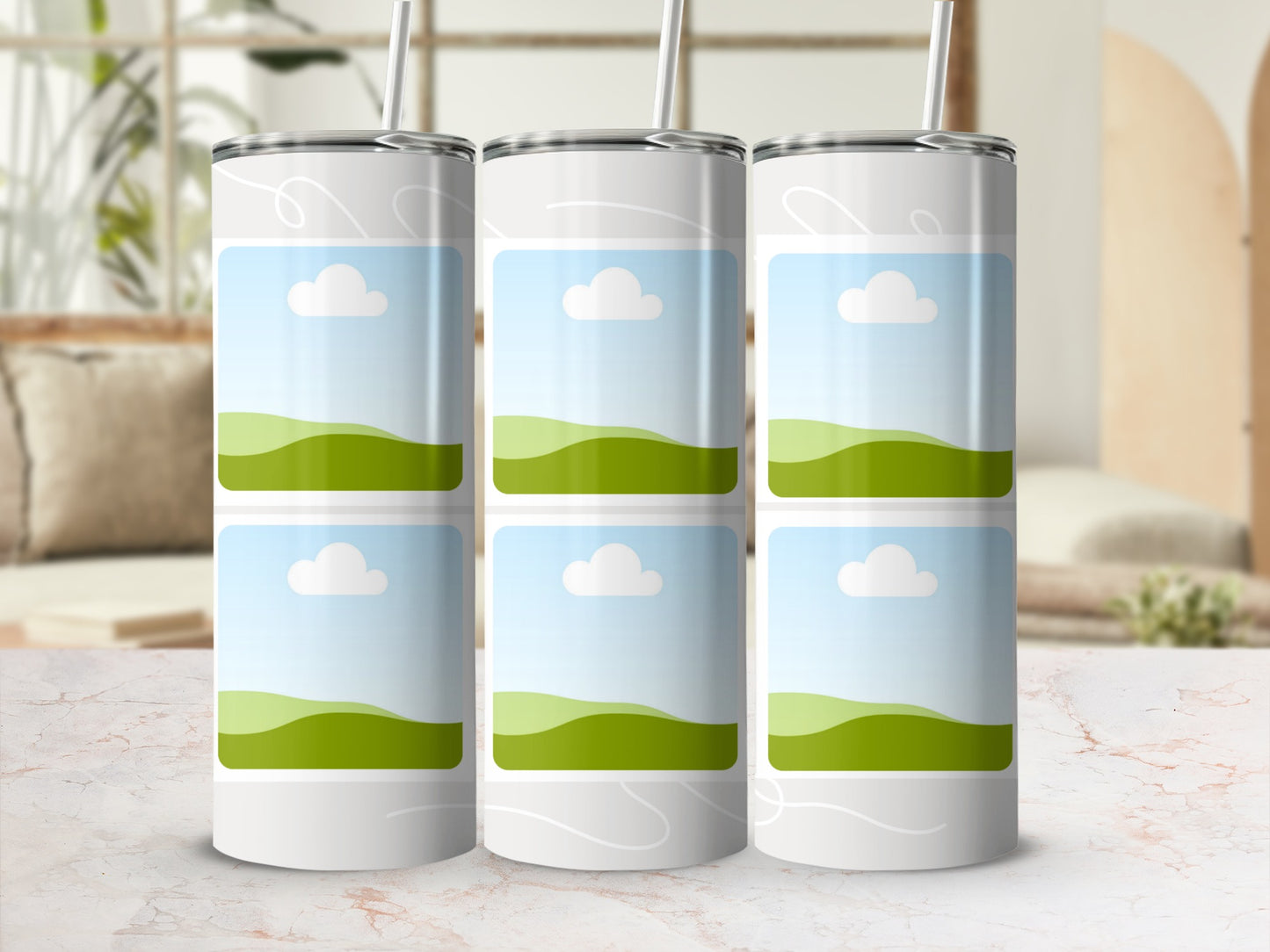 Three white tumblers with illustrated landscape placeholders stand on a marble surface.