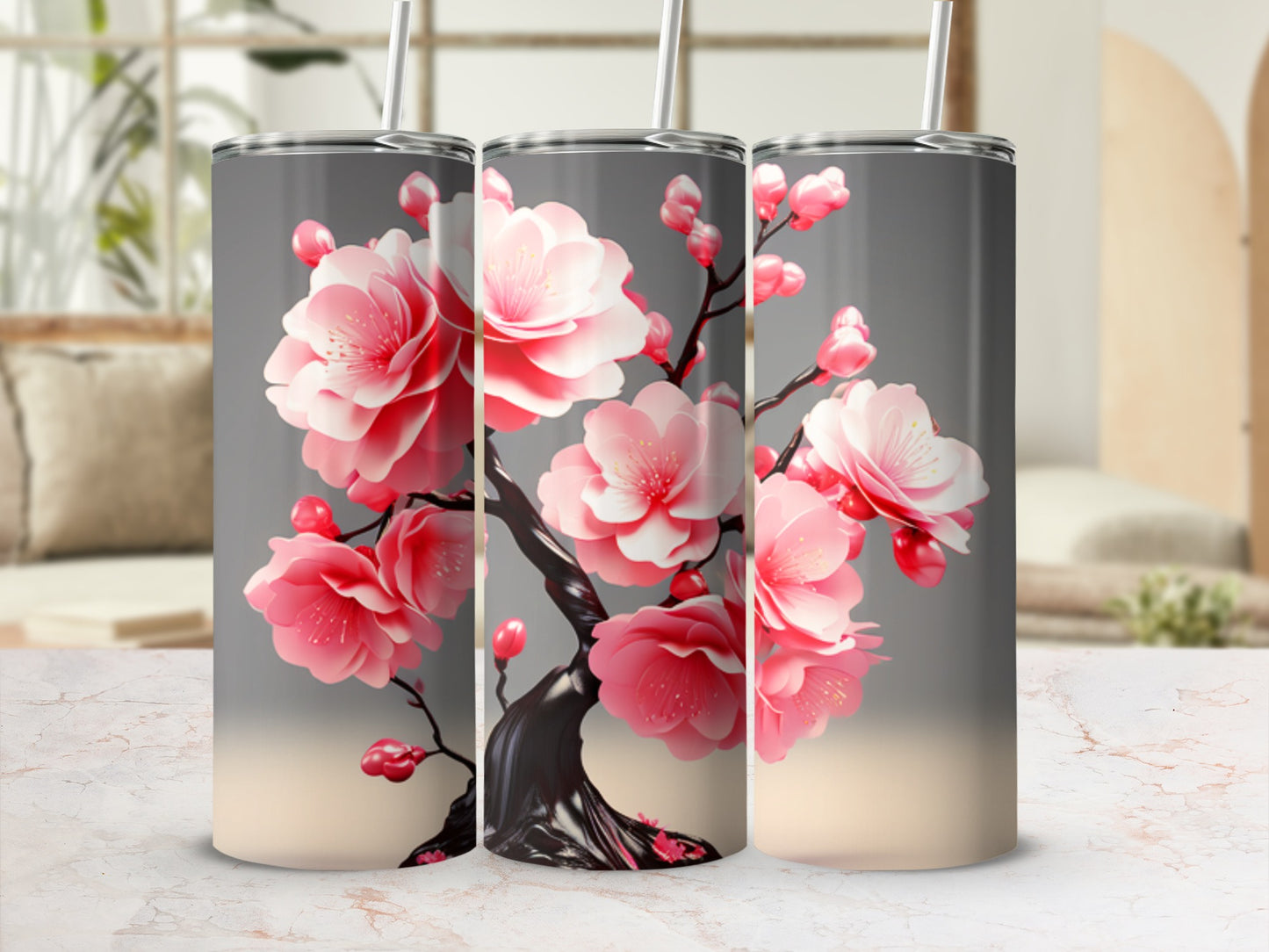 Three tumblers with a pink cherry blossom branch design.