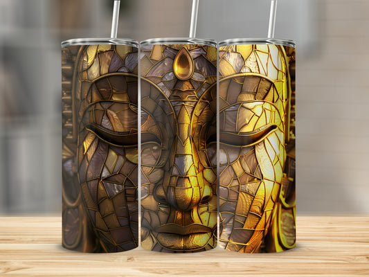 Three tumblers with intricate golden Buddha face design on a wooden surface.