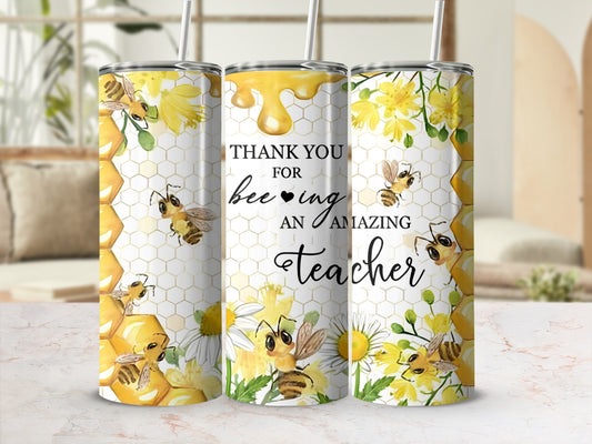 Tumbler with bees, sunflowers, and honeycomb pattern, "Thank You for Being an Amazing Teacher" text.
